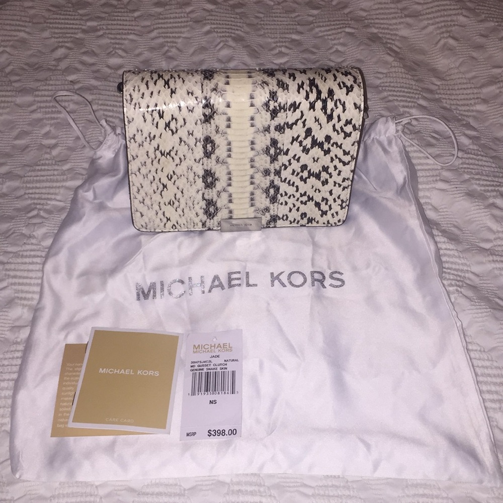 Black/white-ish Snake print bag with chain.
